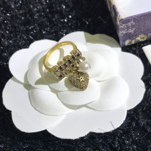 Diorevolution Ring Metal with Resin Pearl, DIOR signature and Heart Charm Embellished Crystals Gold